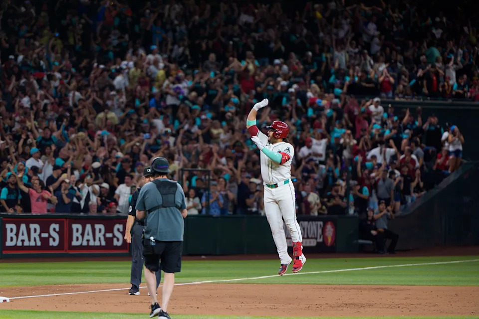 Arizona Diamondbacks infielder Eugenio Suarez (28) reacts after hitting his fourth home run of the game against the Atlanta Braves during the ninth inning at Chase Field in Phoenix, on April 26, 2025.