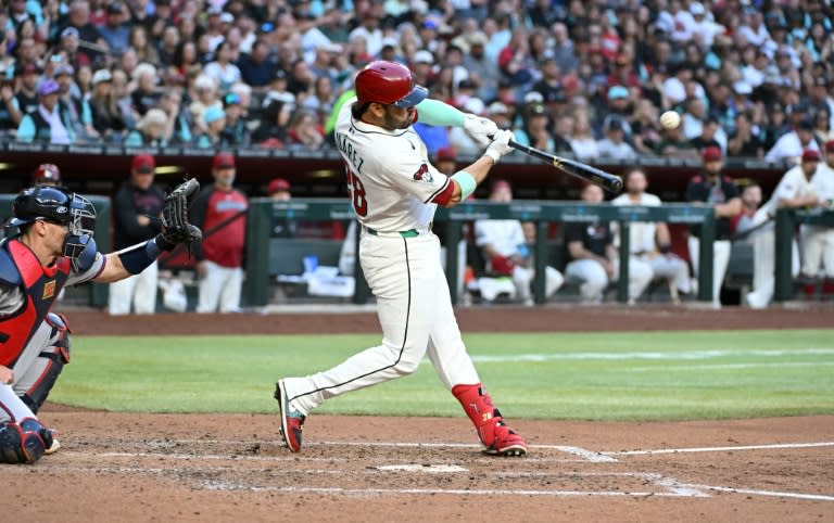 Eugenio Suarez of the Arizona Diamondbacks hits a two run home run in the fourth inning against the Atlanta Braves (Norm Hall)