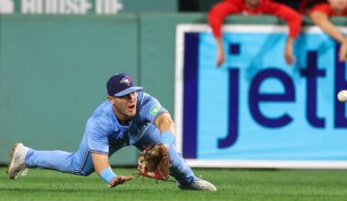 Blue Jays' Daulton Varsho returns with spectacular tumbling catch