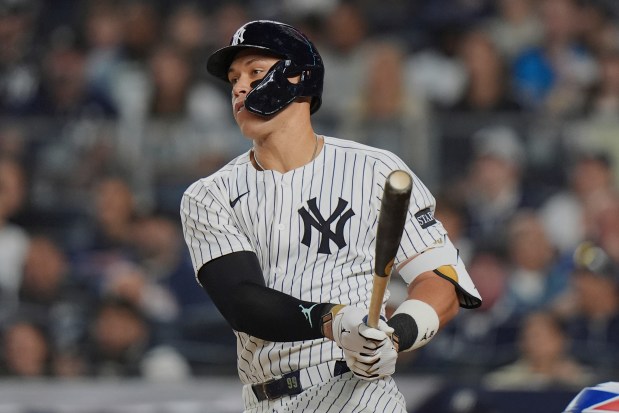 New York Yankees' Aaron Judge hits a single during the fifth inning of a baseball game against the Toronto Blue Jays Friday, April 25, 2025, in New York. (AP Photo/Frank Franklin II)