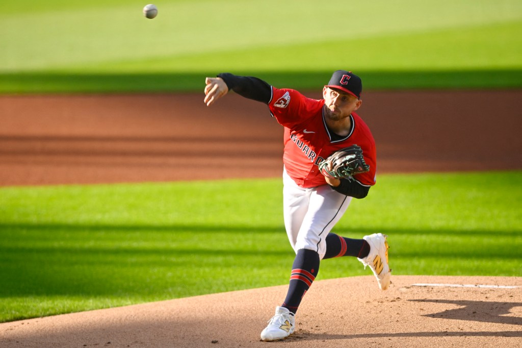 Cleveland Guardians starting pitcher, Tanner Bibee, delivering a pitch against the New York Yankees at Progressive Field.
