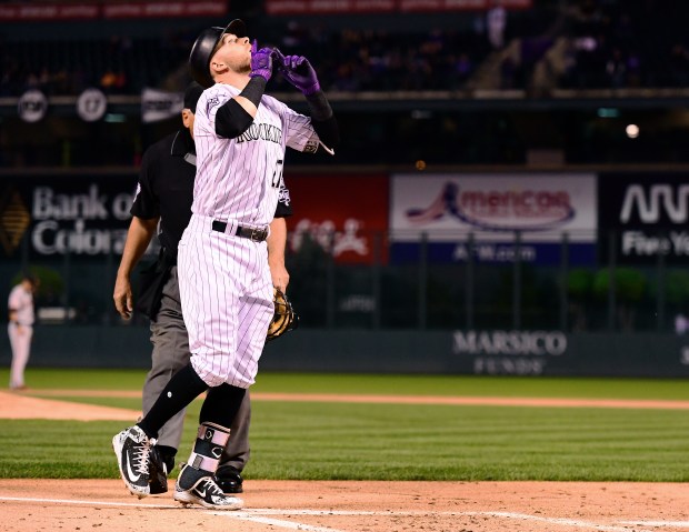 Trevor Story (27) of the Colorado Rockies celebrates after a home run in the first inning of a baseball game against the San Francisco Giants on Sept. 5, 2018, at Coors Field in Denver. (Photo by Julio Aguilar/Getty Images)