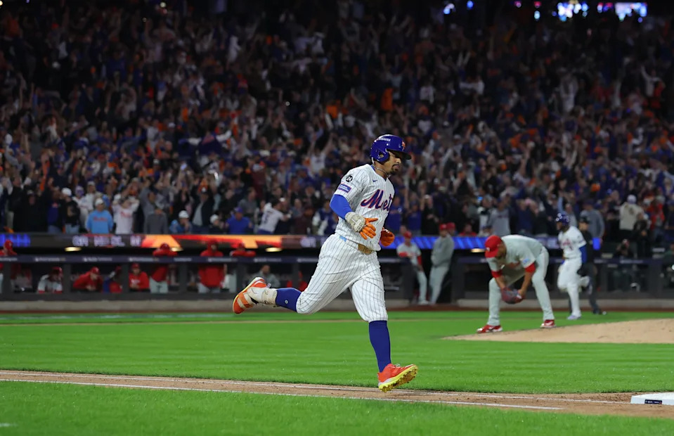New York Mets shortstop Francisco Lindor rounds the bases after hitting a grand slam against the Philadelphia Phillies in Game 4 of the National League Division Series.