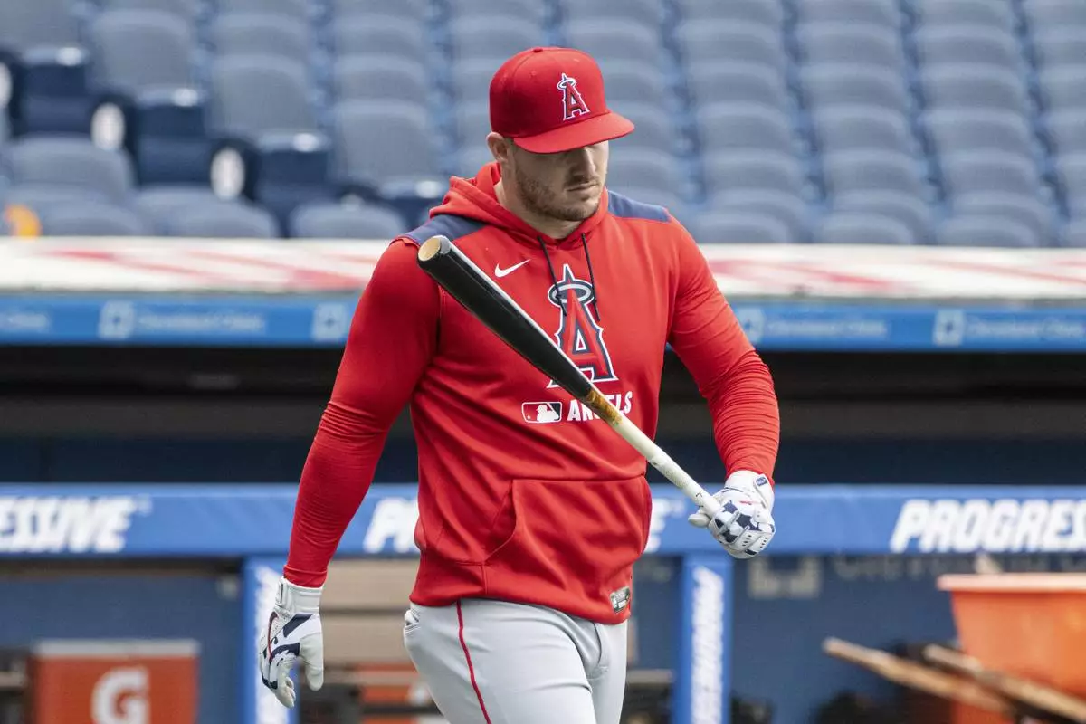 Los Angeles Angels' Mike Trout walks from the batting cage before a baseball game against the Cleveland Guardians, Friday, May 30, 2025, in Cleveland. (AP Photo/Phil Long)
