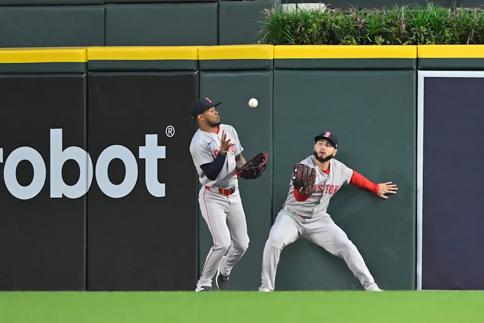 DETROIT, MI - MAY 14: Boston Red Sox RF Wilyer Abreu (52) has a fly ball bounce off his glove, only to caught by Boston Red Sox CF Ceddanne Rafaela (3) for the out during the game between Boston Red Sox and Detroit Tigers on May 14, 2025 at Comerica Park in Detroit, MI (Photo by Allan Dranberg/Icon Sportswire via Getty Images)
