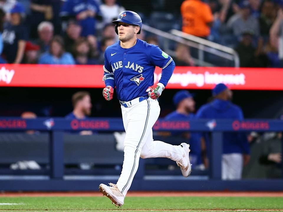Daulton Varsho of the Toronto Blue Jays runs the bases after hitting a solo home run in the fourth inning during a game against the Tampa Bay Rays at Rogers Centre on Tuesday, May 13, 2025, in Toronto.