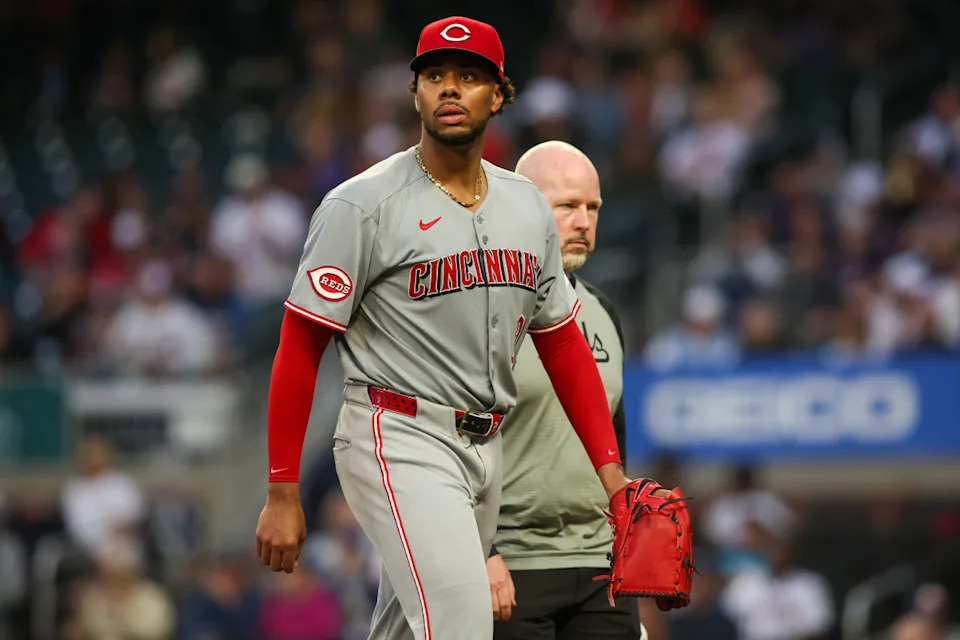 Cincinnati Reds starting pitcher Hunter Greene (21) leaves the game with an injury against the Atlanta Braves in the fourth inning at Truist Park. Mandatory Credit: Brett Davis-Imagn Images© Brett Davis-Imagn Images