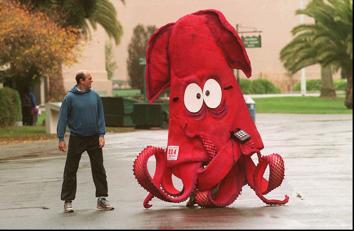 Ron Seawright, of San Francisco, with his entry “Call Harry’s Squid-Be-Gone” takes part in the annual Run to the Far Side race held at Golden Gate Park in San Francisco, on Sunday Nov. 27, 1994. Seawright, this year’s costume winner, drew a few second loo