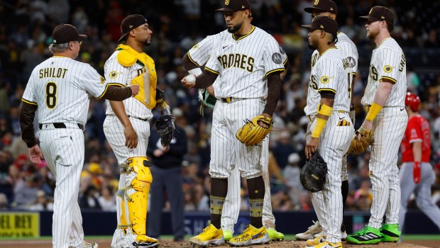The Padres' Robert Suarez is pulled from Monday's game by manager Mike Shildt in the ninth inning. (K.C. Alfred / The San Diego Union-Tribune)