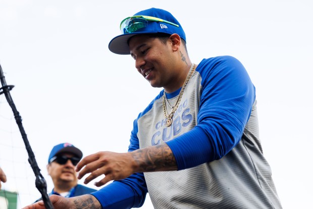 Chicago Cubs catcher Moisés Ballesteros signs autographs before making his debut against the Miami Marlins at Wrigley Field Tuesday May 13, 2025, in Chicago. (Armando L. Sanchez/Chicago Tribune)