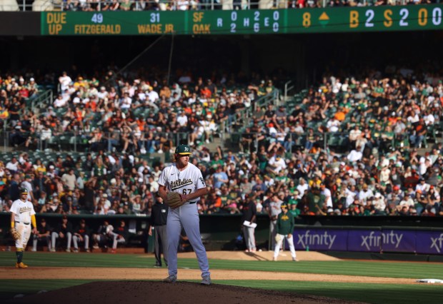 Oakland Athletics pitcher Grant Holman (67) pitches against the San Francisco Giants on his MLB debut in the seventh inning at the Coliseum in Oakland, Calif., on Saturday, Aug. 17, 2024. (Ray Chavez/Bay Area News Group)