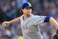 Texas Rangers starting pitcher Jacob deGrom throws against the Detroit Tigers during the...