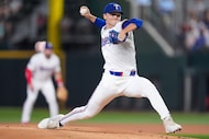 Texas Rangers pitcher Jack Leiter delivers during the first inning of a baseball game...