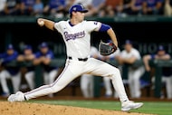 Texas Rangers starting pitcher Cole Winn (60) throws during the ninth inning against the...