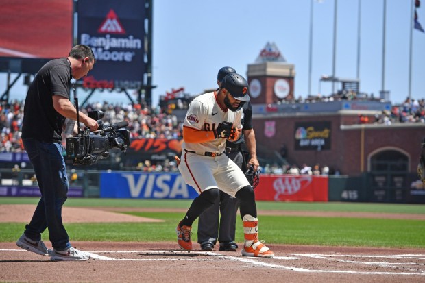 San Francisco Giants' Heliot Ramos (17) stomps on home plate after hitting a solo home run in the first inning of their MLB game at Oracle Park in San Francisco, Calif., on Sunday, May 18, 2025. (Jose Carlos Fajardo/Bay Area News Group)