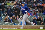 Texas Rangers Corey Seager (5) runs the bases after hitting a home run during the first...