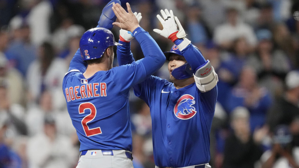 Suzuki hits 13th home run as Cubs roar back to beat Reds