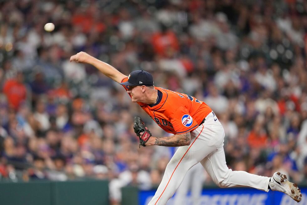 Houston Astros starting pitcher Hunter Brown throws during the first inning of a baseball game...