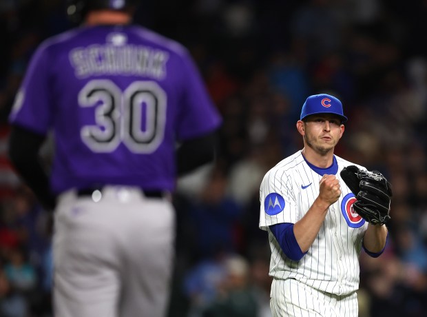 Cubs reliever Chris Flexen pumps his fist after finishing off the Rockies during a scoreless 10th inning on May 27, 2025, at Wrigley Field. (Chris Sweda/Chicago Tribune)