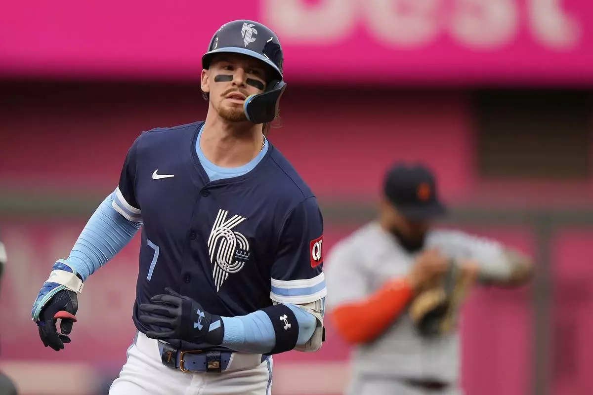 Kansas City Royals' Bobby Witt Jr. runs the bases after hitting a solo home run during the first inning of a baseball game against the Detroit Tigers, Friday, May 30, 2025, in Kansas City, Mo. (AP Photo/Charlie Riedel)