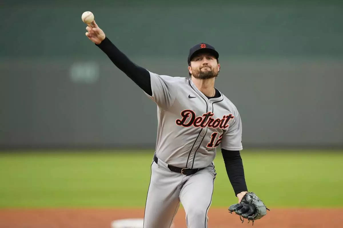 Detroit Tigers starting pitcher Casey Mize throws during the first inning of a baseball game against the Kansas City Royals, Friday, May 30, 2025, in Kansas City, Mo. (AP Photo/Charlie Riedel)