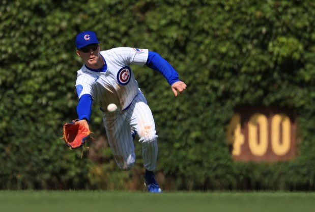 Cubs center fielder Pete Crow-Armstrong catches a ball hit by Reds center fielder TJ Friedl for an out in the ninth inning on May 31, 2025, at Wrigley Field. (John J. Kim/Chicago Tribune)
