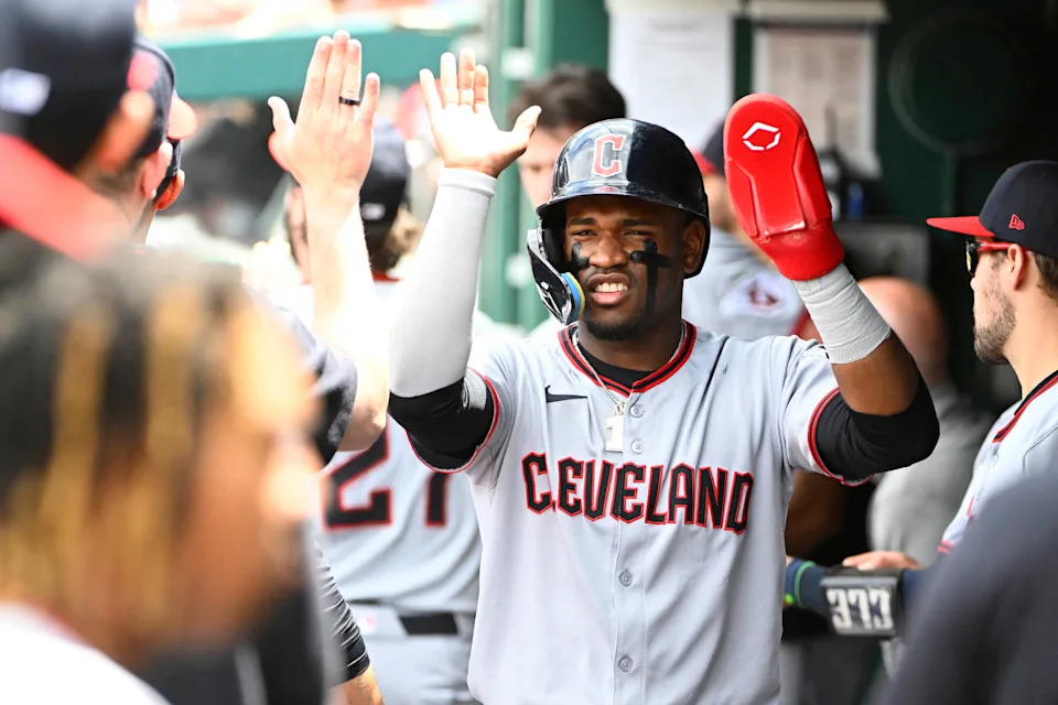 May 7, 2025; Washington, District of Columbia, USA; Cleveland Guardians center fielder Angel Martinez (1) is congratulated by teammates after scoring a run against the Washington Nationals during the sixth inning at Nationals Park. Mandatory Credit: Brad Mills-Imagn Images