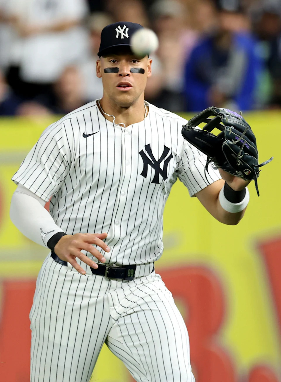 NEW YORK, NEW YORK - MAY 20: Aaron Judge #99 of the New York Yankees fields a single hit by Adolis GarcÃÂa #53 of the Texas Rangers during the sixth inning at Yankee Stadium on May 20, 2025 in New York City.