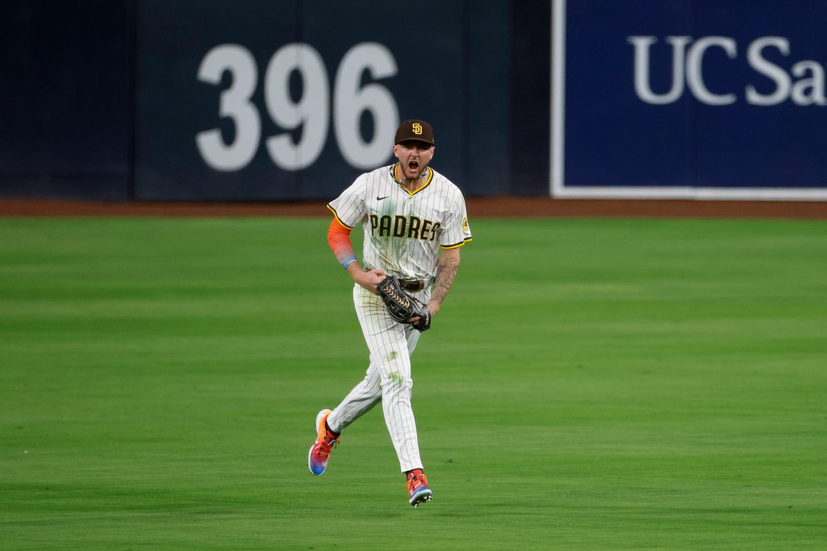 Jackson Merrill #3 of the San Diego Padres celebrates after a diving catch against the Los Angeles Angels at Petco Park on May 12, 2025 in San Diego, California.
