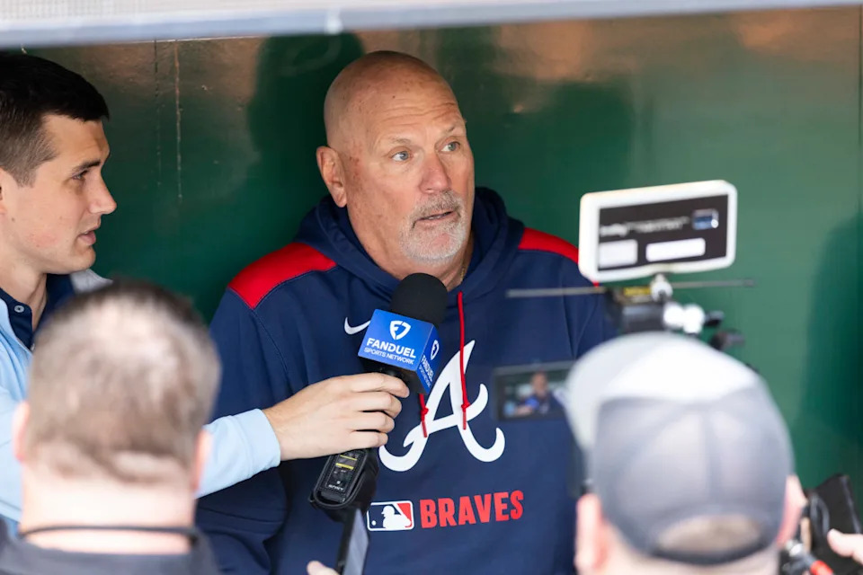 Atlanta Braves manager Brian Snitker speaking with media at PNC Park.Scott Galvin-Imagn Images