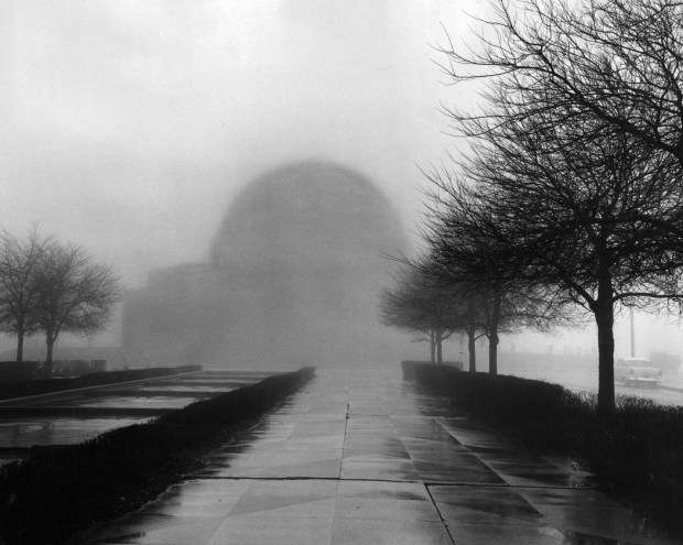 The Adler Planetarium in a wraithlike outline on April 5,...