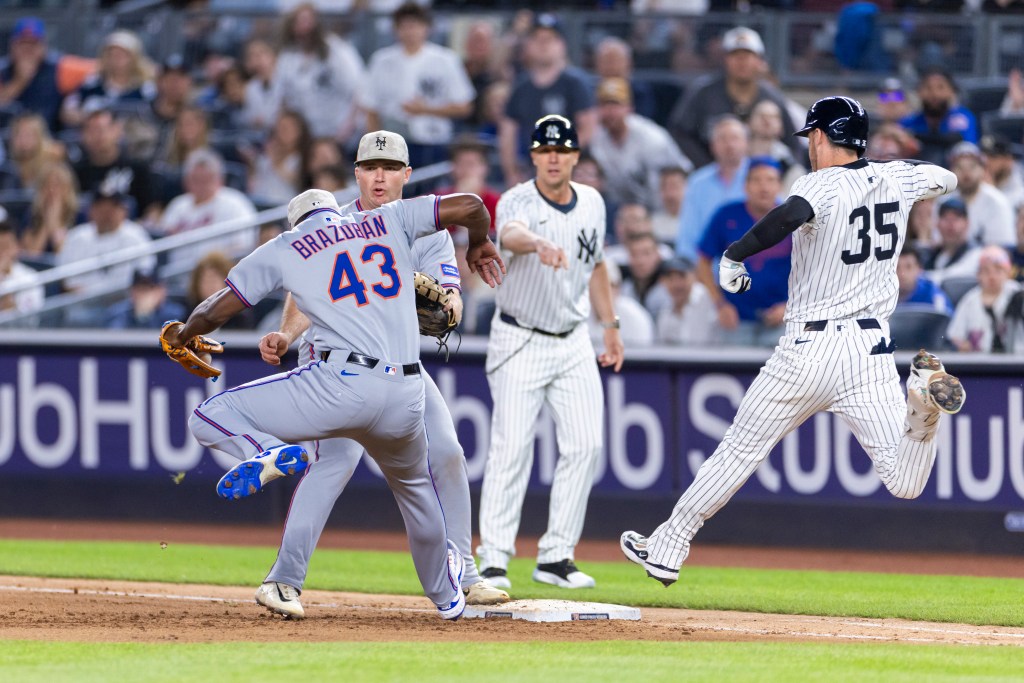 Cody Bellinger #35 of the New York Yankees reaches on an infield single in the seventh inning at Yankee Stadium, Sunday, May 18, 2025.