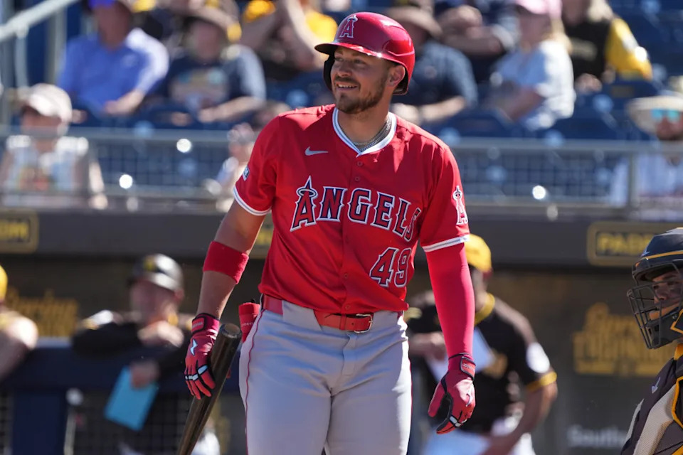 Los Angeles Angels first base Ryan Noda (49) reacts after winning an appeal on a strike three call that was reversed during the fourth inning against the San Diego Padres at Peoria Sports Complex.Rick Scuteri-Imagn Images