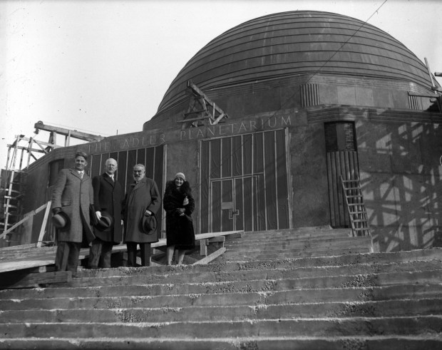 Professor Philip Fox, an astronomer, from left, Max Adler, the...