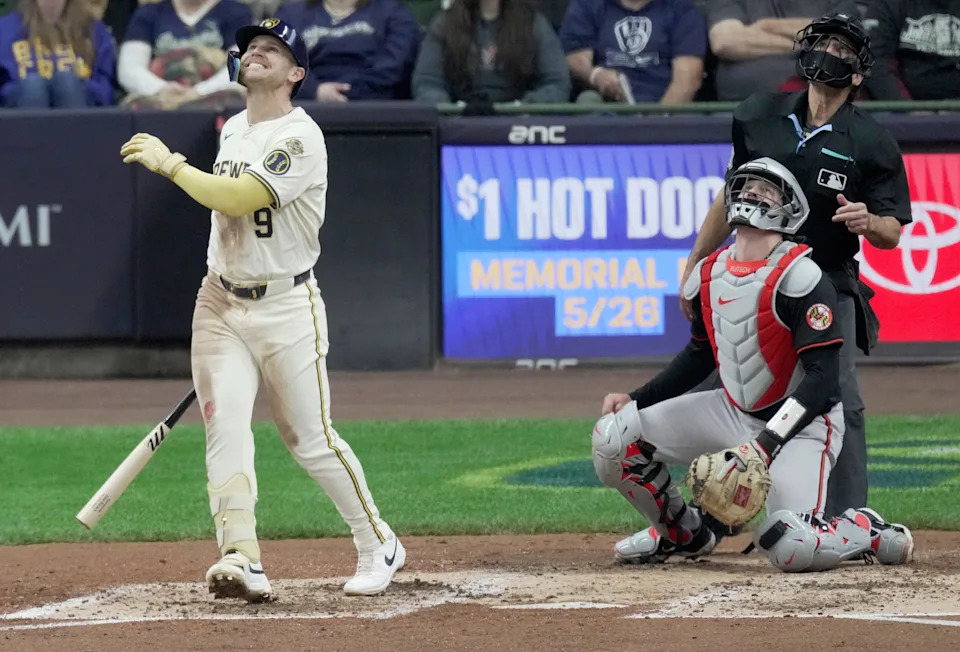The Brewers' Jake Bauers grimaces after hitting a fly ball that stranded a runner on base in the fourth inning of their game against the Orioles on May 21.