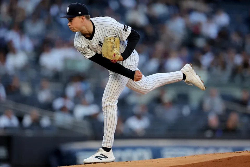 May 20, 2025; Bronx, New York, USA; New York Yankees starting pitcher Will Warren (98) follows through on a pitch against the Texas Rangers during the first inning at Yankee Stadium.