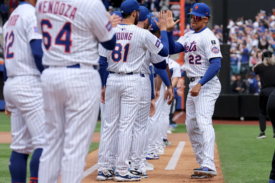 New York Mets right fielder Juan Soto (22) is introduced before the Mets home opener against the Toronto Blue Jays on April 4, 2025, at Citi Field.