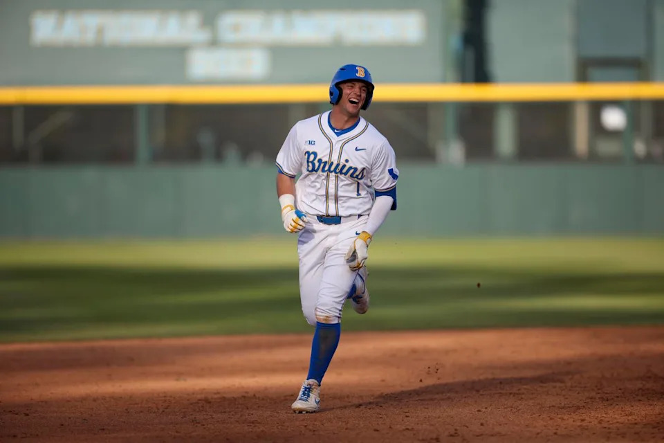 UCLA's Roch Cholowsky smiles as he trots around the bases after hitting a home run against USC on March 2.