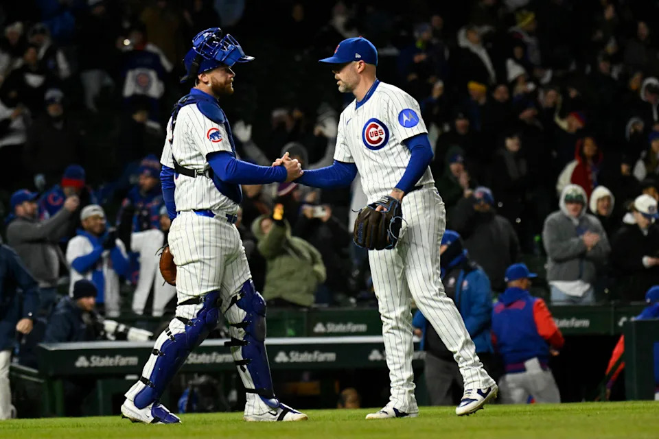 Chicago Cubs pitcher Ryan Pressly (55) and catcher Miguel Amaya (9) after the game against the Texas Rangers at Wrigley Field.Matt Marton-Imagn Images