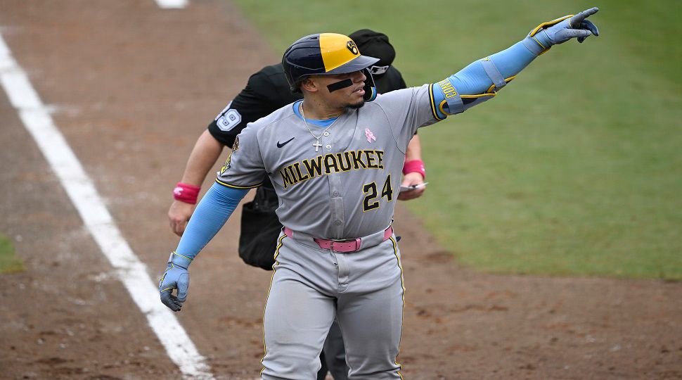 Milwaukee Brewers' William Contreras (24) points toward the stands after hitting a solo home run during the fourth inning of a baseball game against the Tampa Bay Rays, Sunday, May 11, 2025, in Tampa, Fla. (AP Photo/Phelan M. Ebenhack)