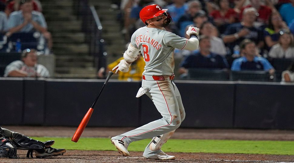 Philadelphia Phillies' Nick Castellanos (8) watches his three-run home run off Tampa Bay Rays pitcher Mason Englert during the eighth inning of a baseball game Tuesday, May 6, 2025, in Tampa, Fla. (AP Photo/Chris O'Meara)