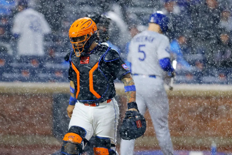 NEW YORK, NEW YORK - MAY 23: Francisco Alvarez #4 of the New York Mets walks off the field as the game is delayed due to rain against the Los Angeles Dodgers at Citi Field on May 23, 2025 in New York City. (Photo by Mike Stobe/Getty Images)