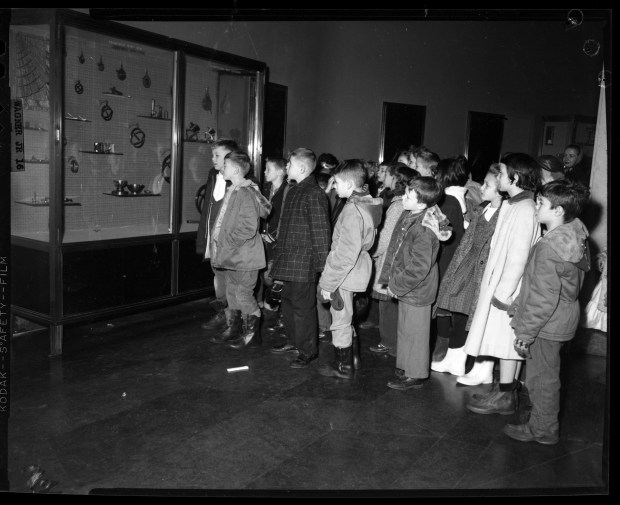 Fourth grade students from Tinley Park Central School look over...
