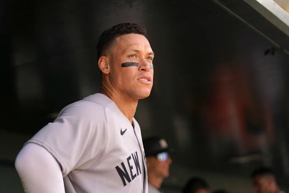 New York Yankees right fielder Aaron Judge (99) stands in the dugout.Cary Edmondson-Imagn Images