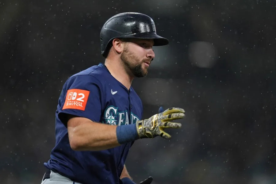 Seattle Mariners’ Cal Raleigh celebrates after hitting a home run during the seventh inning of a baseball game against the San Diego Padres Saturday, May 17, 2025, in San Diego. (AP Photo/Gregory Bull)