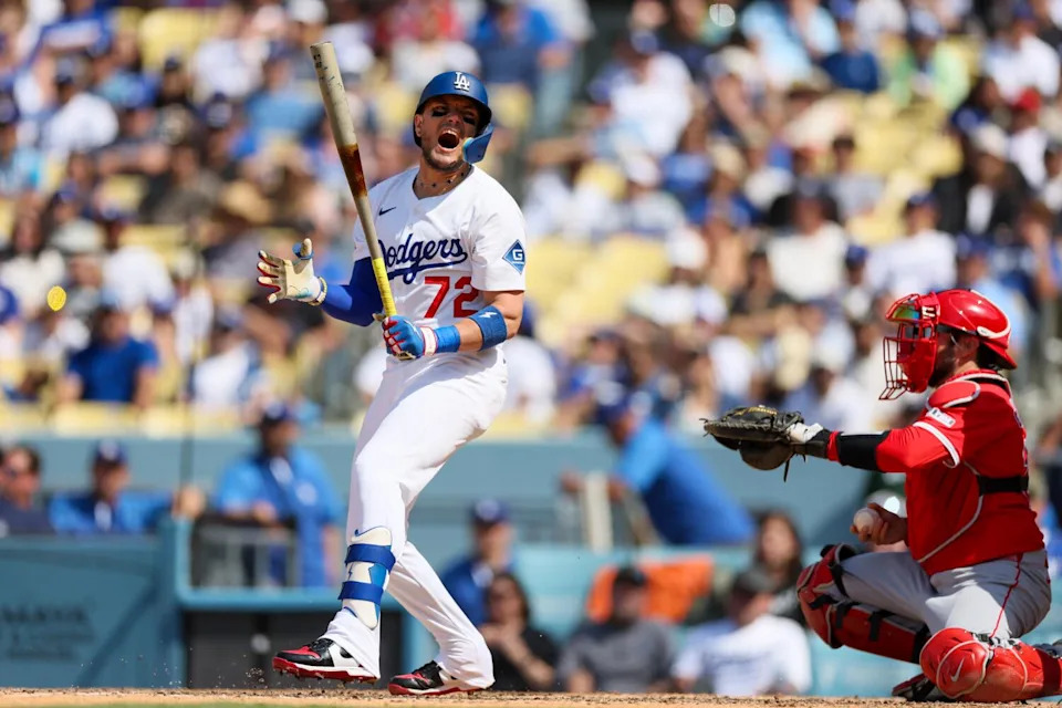 Dodgers second baseman Miguel Rojas shouts in frustration after striking out against the Angels.