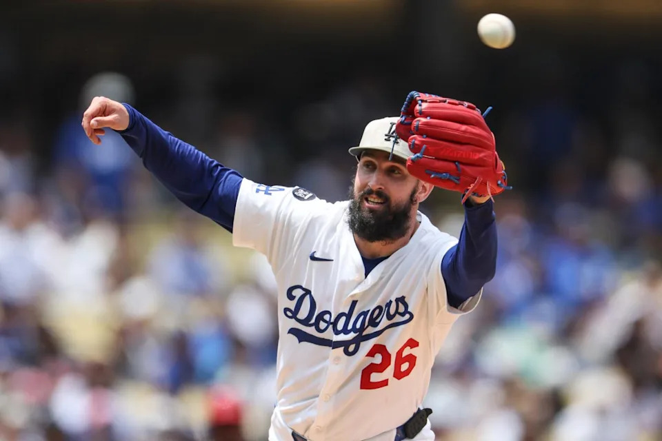 Dodgers pitcher Tony Gonsolin can't field a ball hit by the Angels' Luis Rengifo in the second inning Sunday.