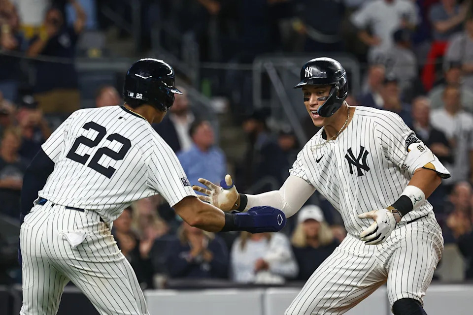 New York Yankees center fielder Aaron Judge celebrates with right fielder Juan Soto (22) after hitting a two-run homer against the Baltimore Orioles.