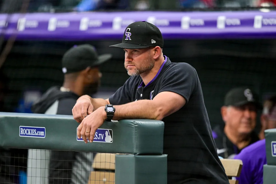 DENVER, CO - MAY 19: Colorado Rockies interim manager Warren Schaeffer (34) looks on from the dugout during a game between the Philadelphia Phillies and the Colorado Rockies at Coors Field on May 19, 2025 in Denver, Colorado. (Photo by Dustin Bradford/Icon Sportswire via Getty Images)