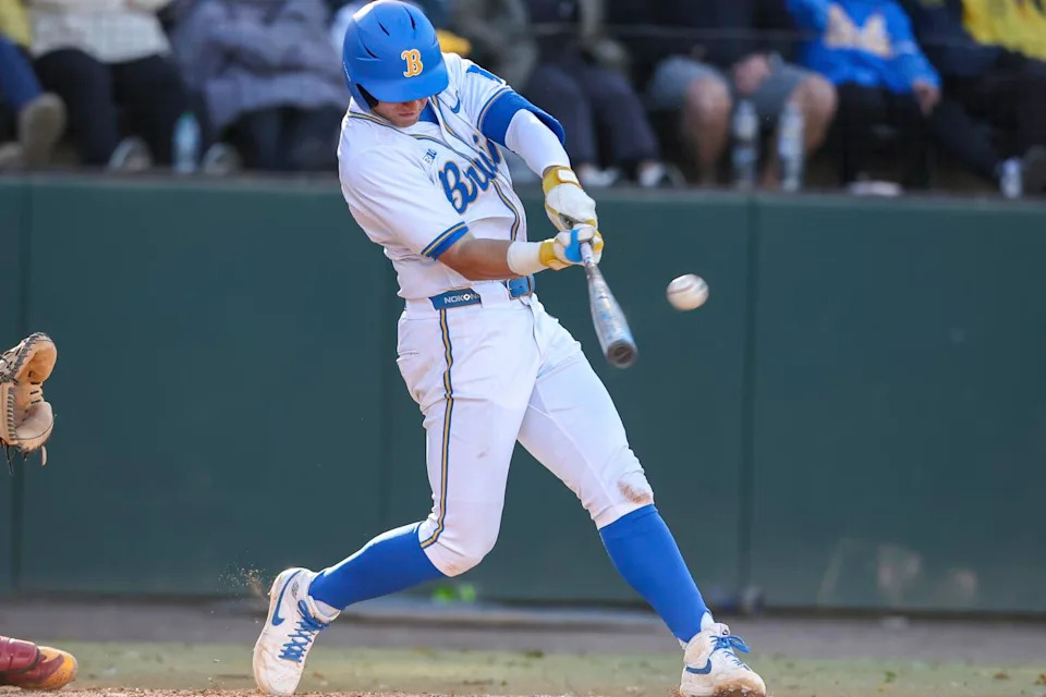 UCLA's Roch Cholowsky hits a three-run homer in the fifth inning against USC on March 2.